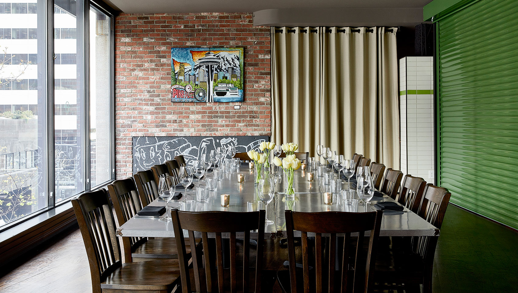 Garage style private dining space overlooking downtown Seattle