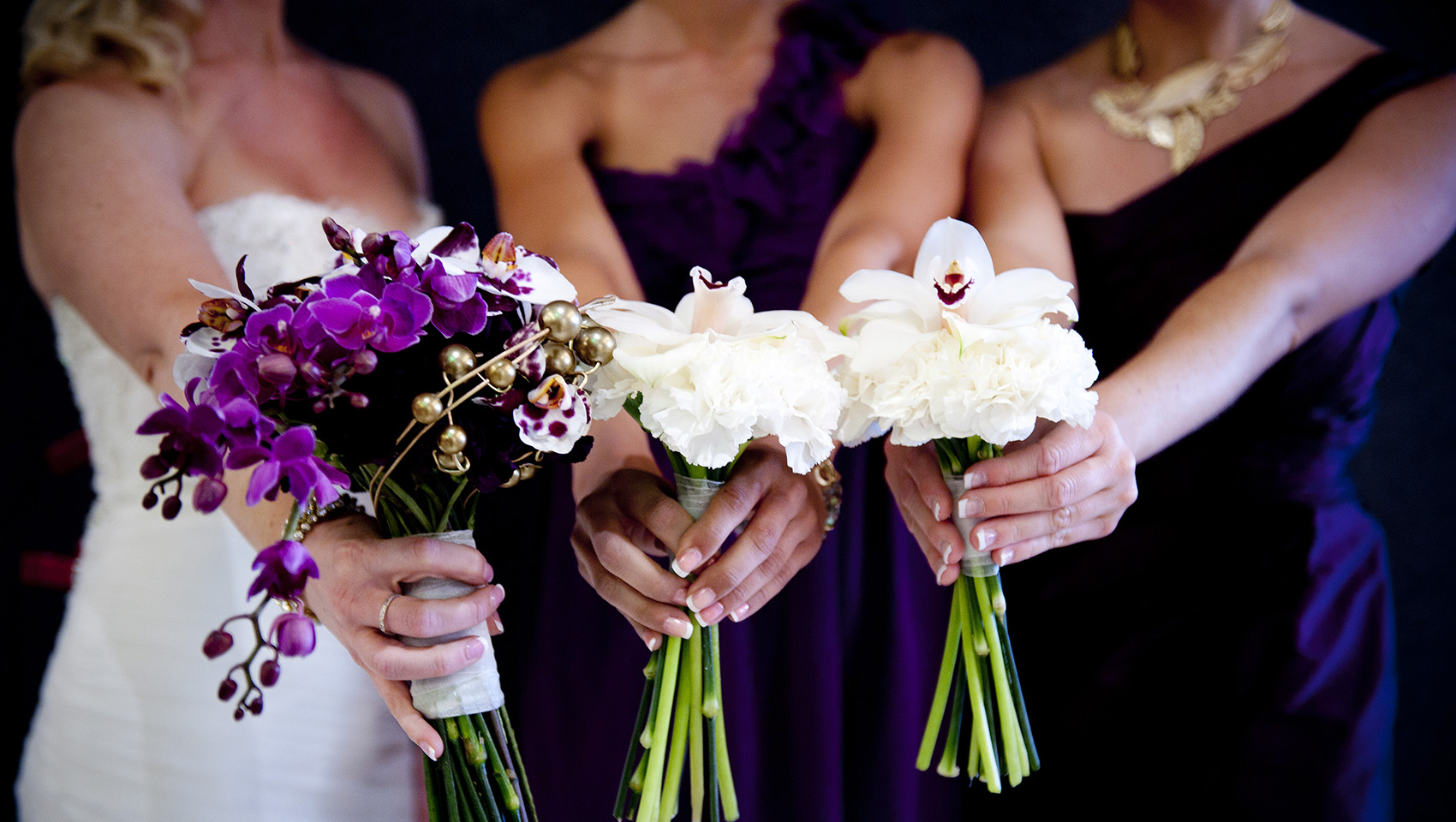 bridal party with bouquet of flowers