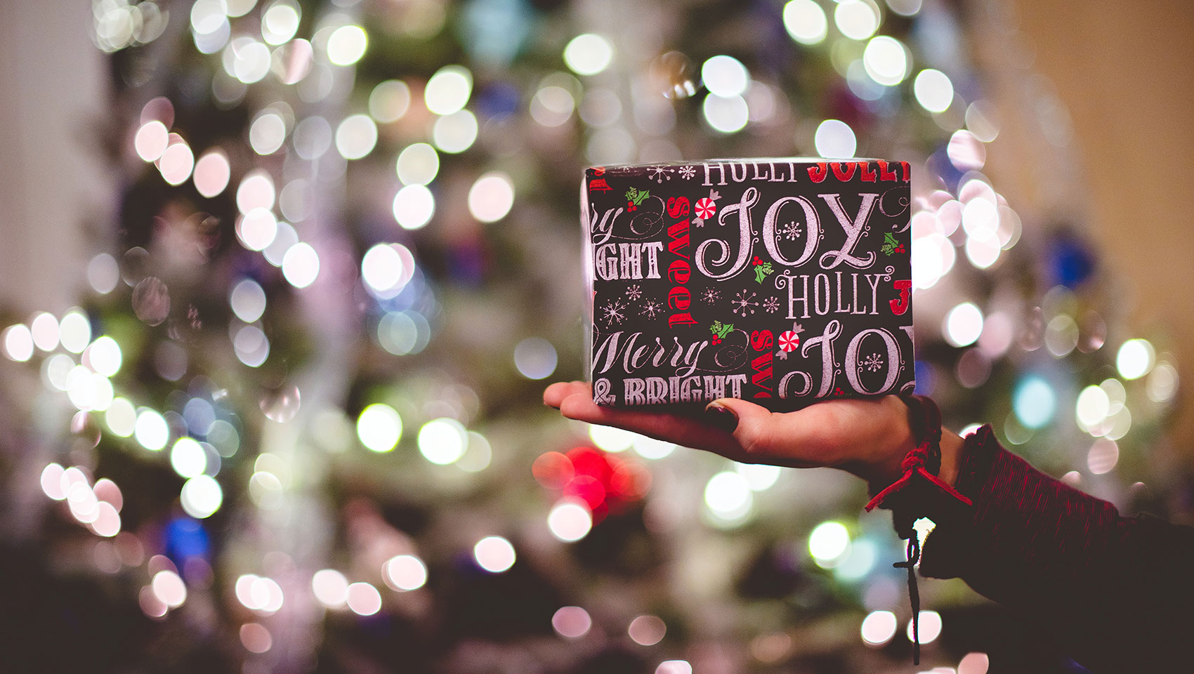 Christmas Gift in front of lights
