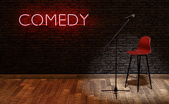 mic and chair on comedy stage